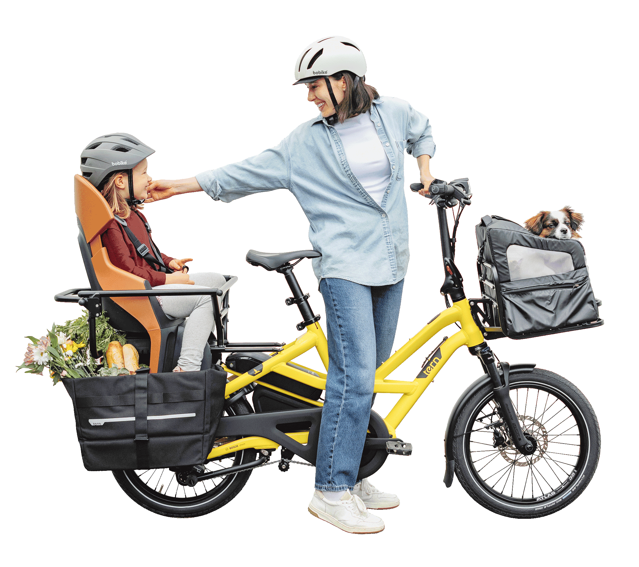 A mom on Tern HSD e-cargo bike with a kid on the rear passenger seat and a dog in the front pet carrier.